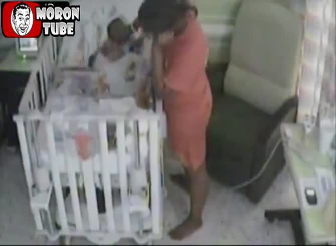 Video :A mother was caught on camera attempting to choke her child